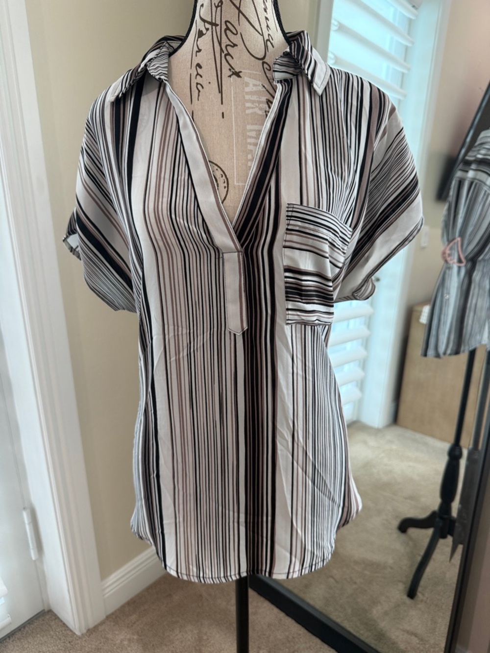 New York & Company Black & White Vertical Stripe V-Neck Tunic